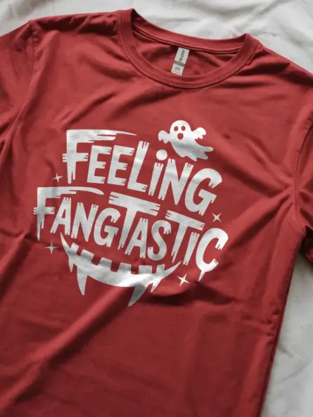 red Lifestyle shot Feeling Fangtastic Halloween T-Shirt with fangs