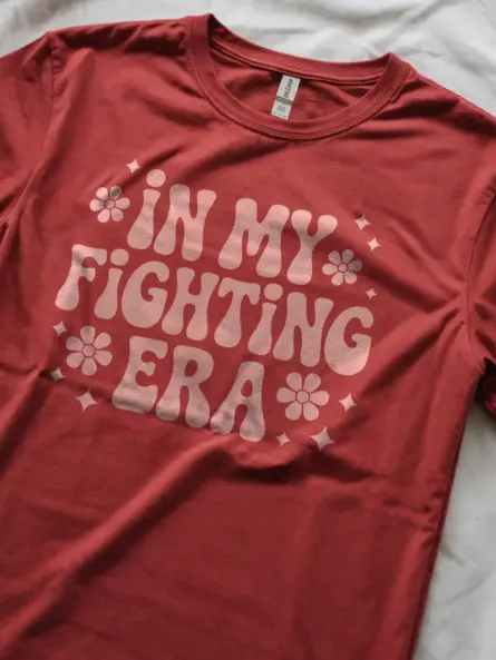 red lifestyle – Grey empowerment tee worn by survivor group
