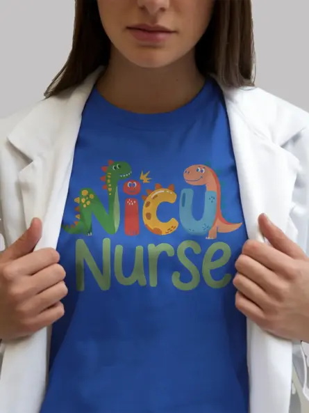 Royal Blue NICU nurse dinosaur t-shirt lifestyle shot – fun pediatric nurse apparel with dinosaur design