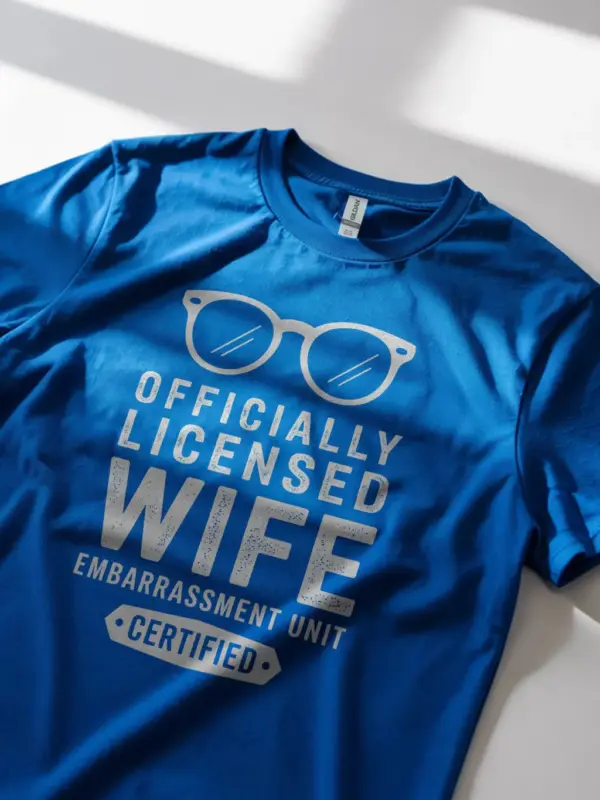 Lifestyle shot royal blue shirt officially licensed wife embarrassment unit funny wife embarrassment t-shirt