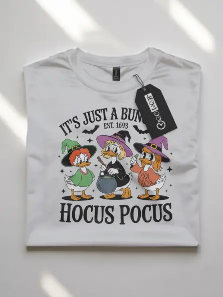 white flatlay Front – Just a Bunch of Hocus Pocus T-Shirt with Funny Duck Witches