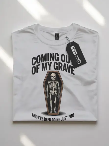 white flatlay Shirt Front View – Coming Out of My Grave – funny skeleton coffin t-shirt