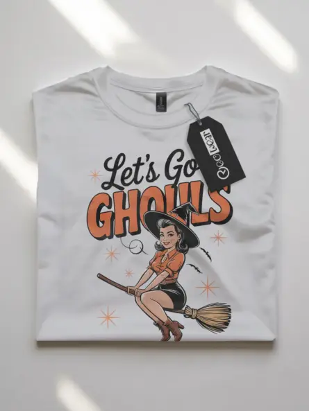 white flatlay front – playful witch broomstick tee in