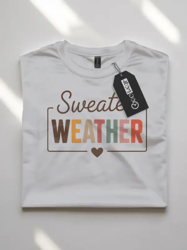 white flatlay – comfy fall themed tee – cozy sweater weather shirt