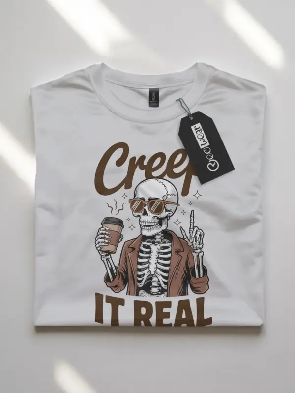 front – Creep It Real funny skeleton coffee shirt in white flatlay