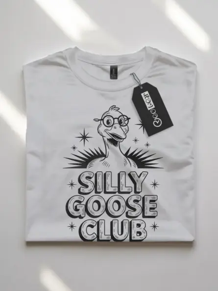 white flatlay lifestyle silly goose club shirt for quirky adults