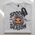 white flatlay Front view white flatlay Shirt spooky season pumpkin t-shirt for fall Halloween outfit