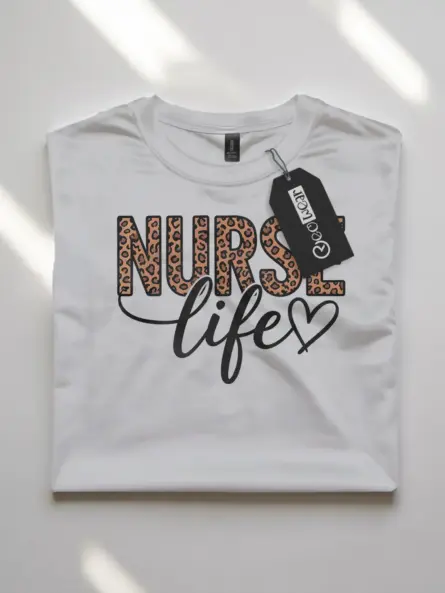 Front view of white leopard print nurse life t-shirt with heart design