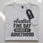white Front view of black shirt with adulthood quote