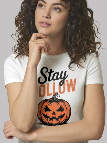 white front – vintage-style pumpkin t-shirt with Stay Hollow phrase