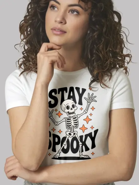 white front – Stay Spooky skeleton shirt with dancing bones