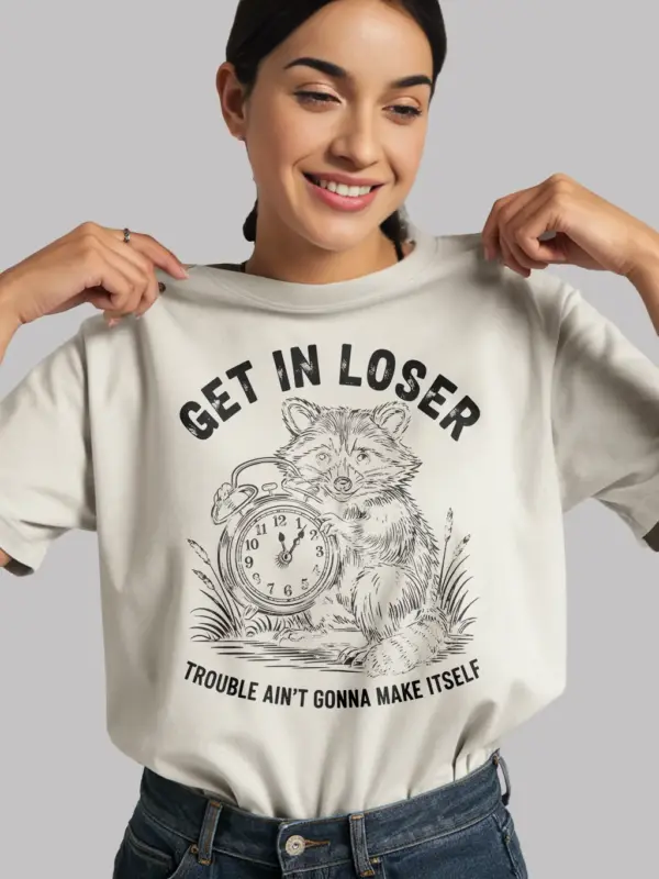 white. Shirt Get In Loser Trouble Ain’t Gonna Make Itself Funny Raccoon Mischief T-Shirt Lifestyle Shot