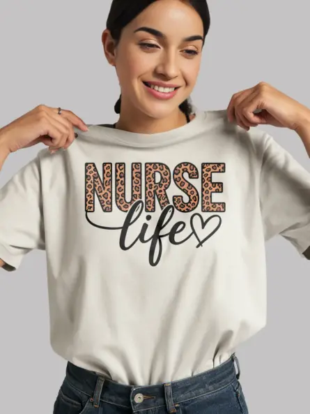 Lifestyle shot of white nurse life t-shirt with animal print and heart