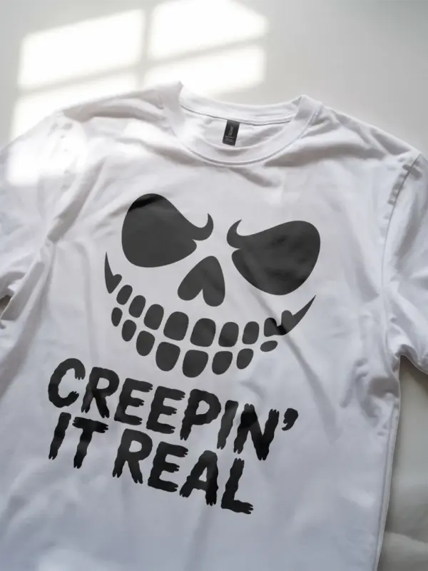 white Creepin It Real Halloween T-Shirt with creepy face