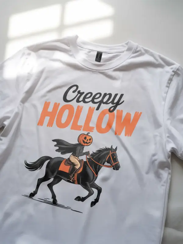 white Creepy Hollow shirt with jack-o'-lantern head rider