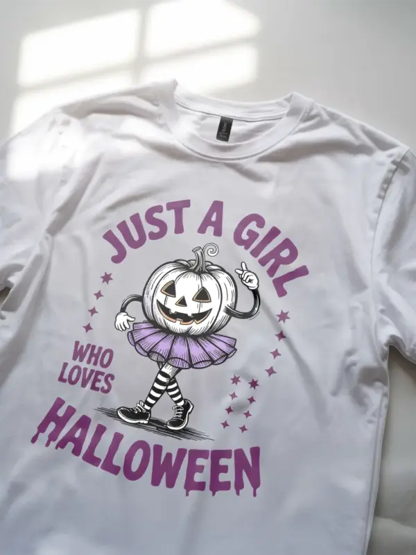 lifestyle – girl in white cute pumpkin girl Halloween t-shirt at fall event