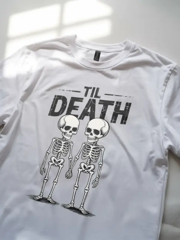 close-up – distressed font and skeleton detail on white gothic skeleton couple t-shirt