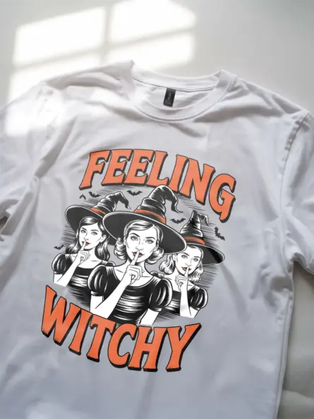 closeup of black and white witchcore illustration on white shirt
