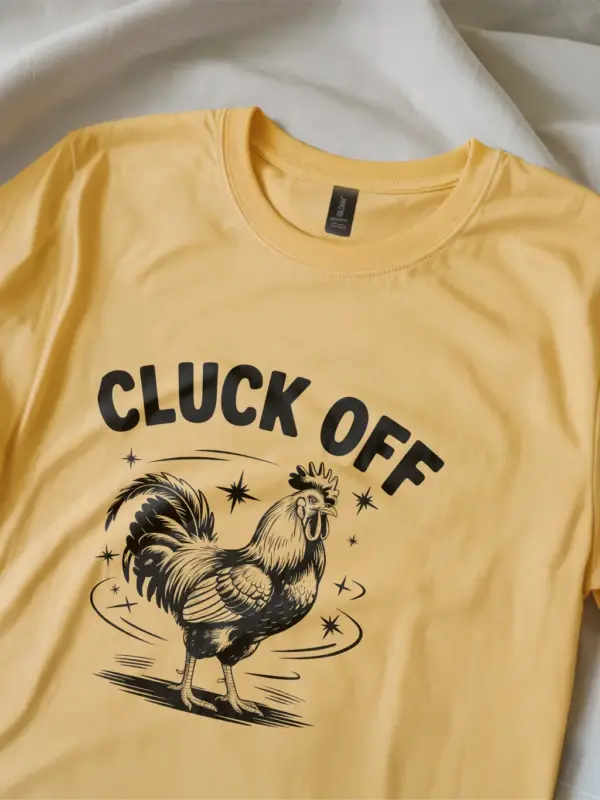 yellow Lifestyle shot of black cluck off chicken shirt for poultry enthusiasts