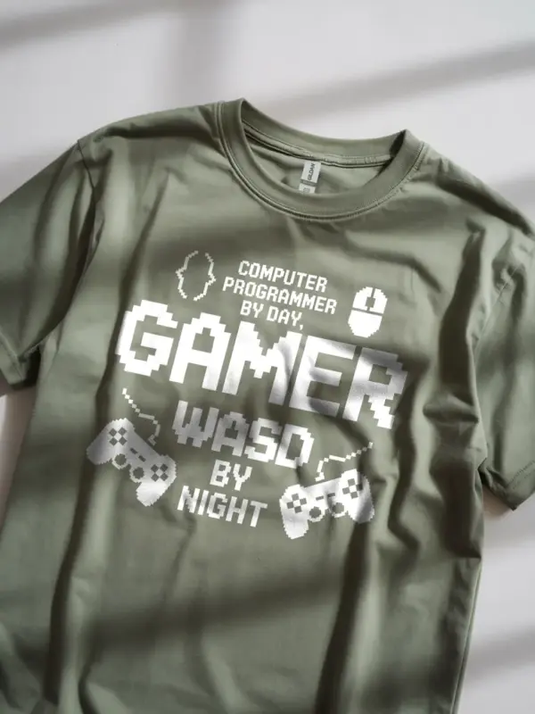 Military green Programmer by Day Gamer by Night T-Shirt Front – Coder Meets Gamer Pixel Tee